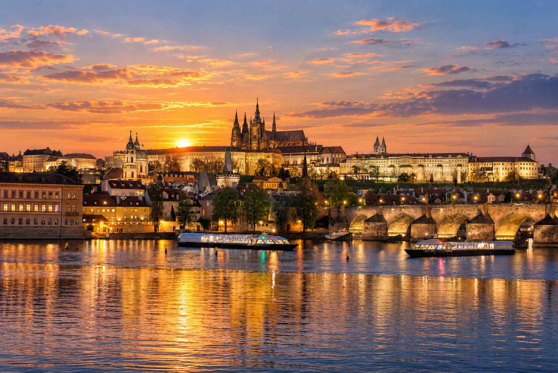 Sunset over Prague Castle and Charles Bridge